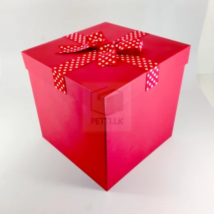 Shiny Red Gift Box with White Polka Dot Ribbon